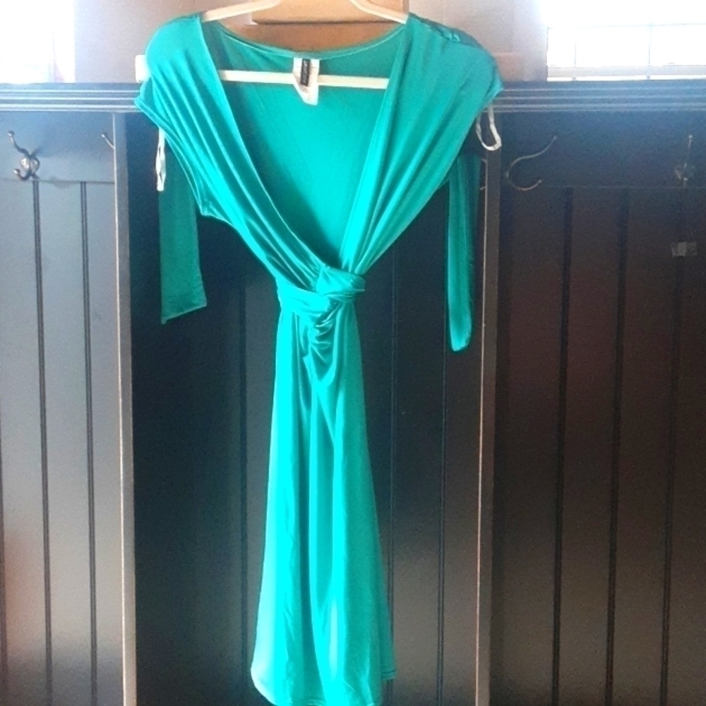 Jantzen size L, teal color 93% polyester,3%spandex vintage wrap around dress